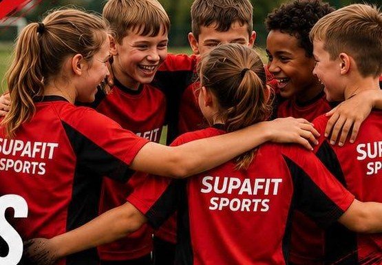 SupaFit children celebrating together in a team huddle